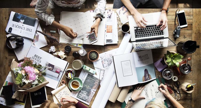 Colleagues working at a desk